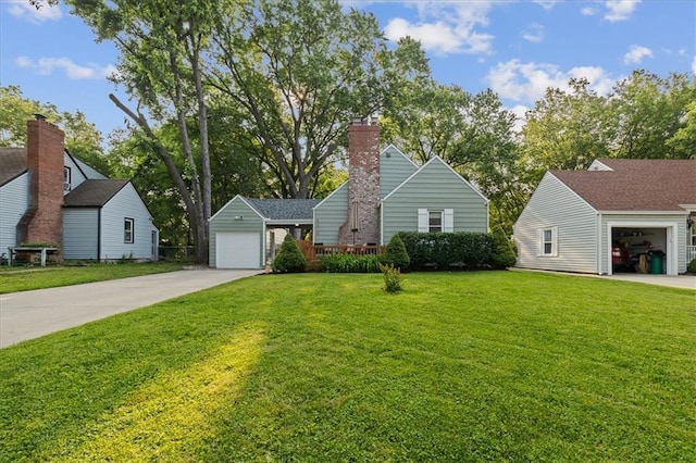 5315 Walmer St, Mission, KS 66202 - view of front of property with a garage, a front yard, a chimney, and driveway