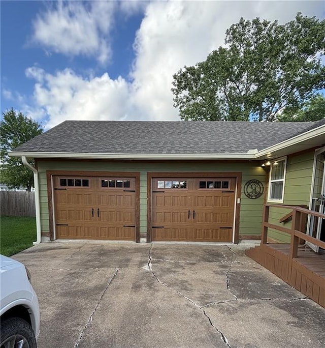 1205 W 14th Street Ct, Chanute, KS 66720 - garage with concrete driveway