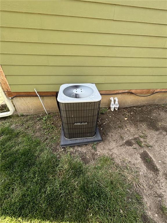 1205 W 14th Street Ct, Chanute, KS 66720 - exterior view of central AC unit