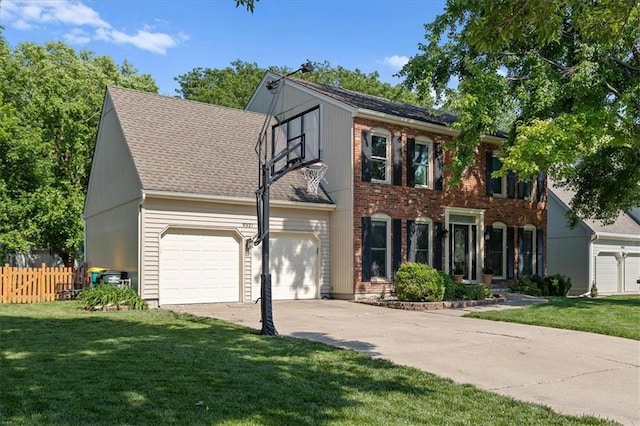 9327 Tomashaw Ln, Lenexa, KS 66219 - colonial-style house with concrete driveway, a garage, and roof with shingles
