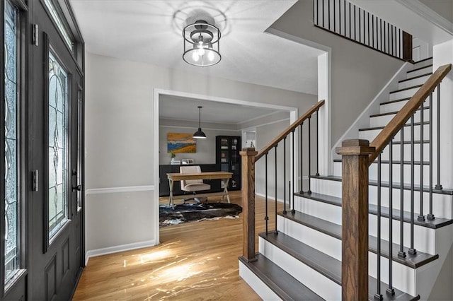 9327 Tomashaw Ln, Lenexa, KS 66219 - foyer with light wood-type flooring and stairs