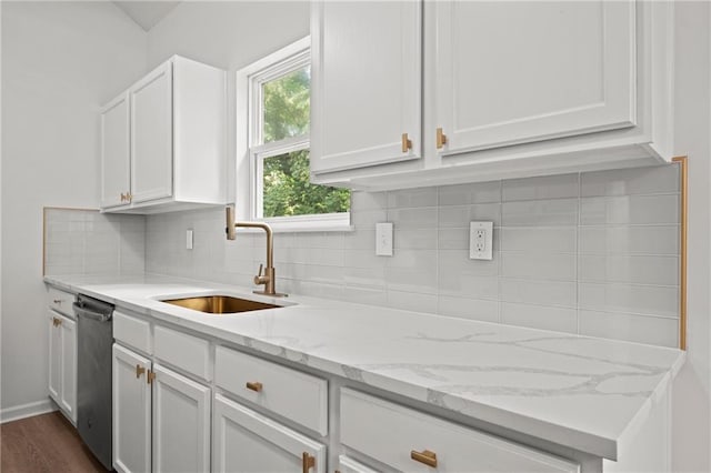 1932 N 80th Ct, Kansas City, KS 66112 - kitchen featuring white cabinetry, stainless steel dishwasher, decorative backsplash, dark wood-style floors, and light stone countertops
