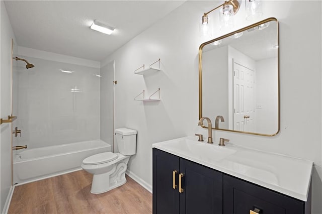 1932 N 80th Ct, Kansas City, KS 66112 - bathroom featuring wood finished floors, vanity, and shower / washtub combination