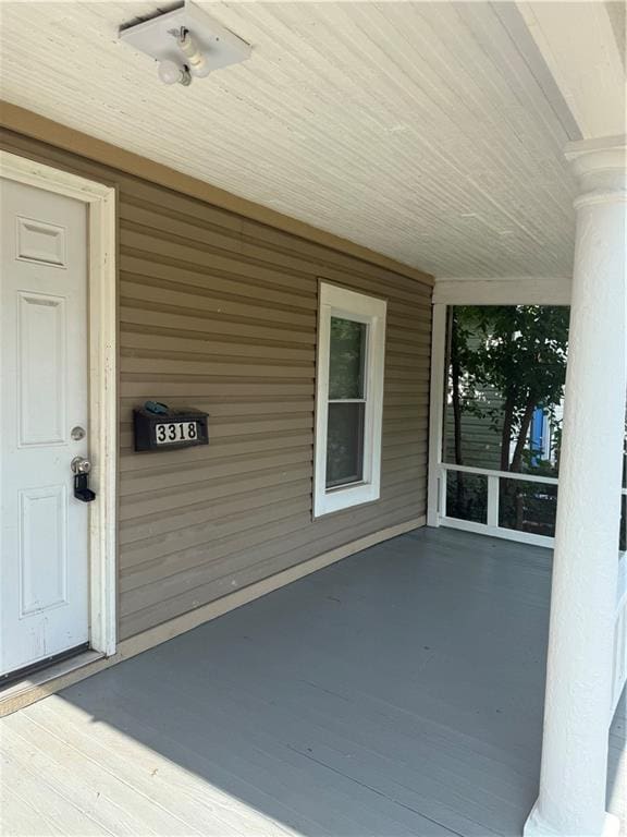 3318 E 24th St, Kansas City, MO 64127 - view of wooden deck