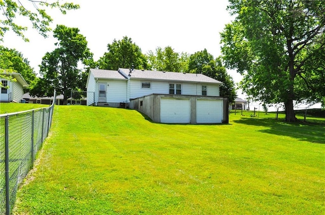 913 N Maple St, Stanberry, MO 64489 - back of house with an attached garage