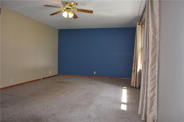 913 N Maple St, Stanberry, MO 64489 - carpeted empty room with ceiling fan and baseboards