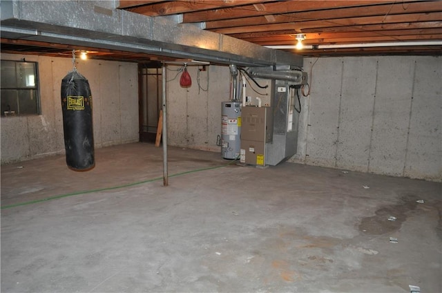 913 N Maple St, Stanberry, MO 64489 - unfinished basement featuring gas water heater and heating unit