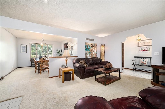 63 Maple Dr, Platte City, MO 64079 - carpeted living area with baseboards and a textured ceiling
