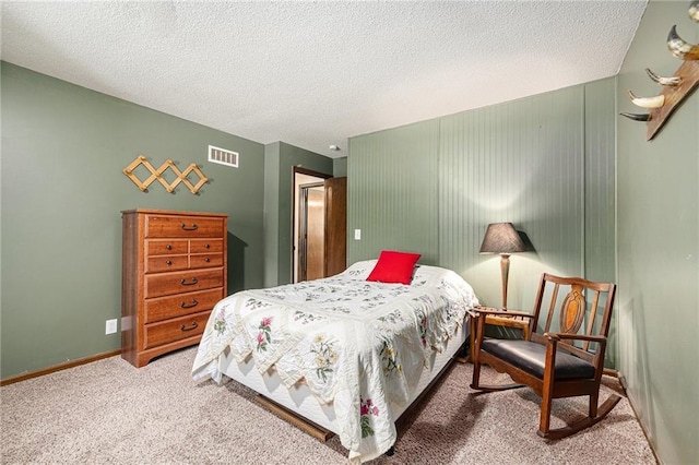 63 Maple Dr, Platte City, MO 64079 - bedroom featuring carpet flooring and a textured ceiling