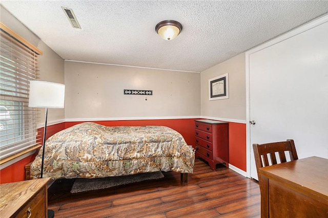 63 Maple Dr, Platte City, MO 64079 - bedroom featuring wood finished floors and a textured ceiling