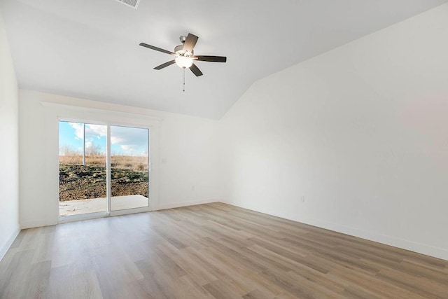 3818 NW 93rd St, Kansas City, MO 64154 - unfurnished room with lofted ceiling, light wood-style floors, a ceiling fan, and baseboards