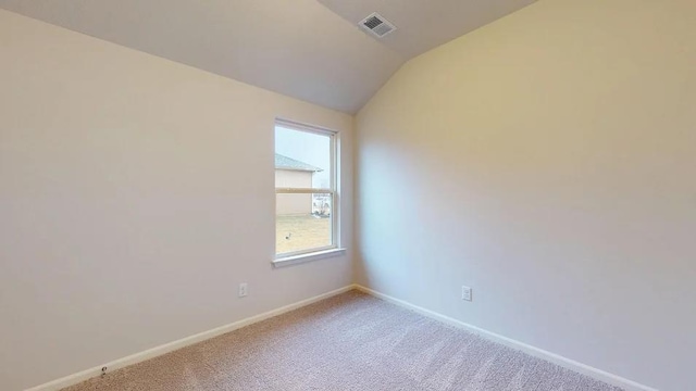 551 W Lanesfield St, Gardner, KS 66030 - carpeted empty room featuring baseboards and vaulted ceiling