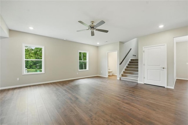 809 Highland Dr, Edwardsville, KS 66111 - spare room featuring stairs, a ceiling fan, dark wood-style flooring, baseboards, and recessed lighting