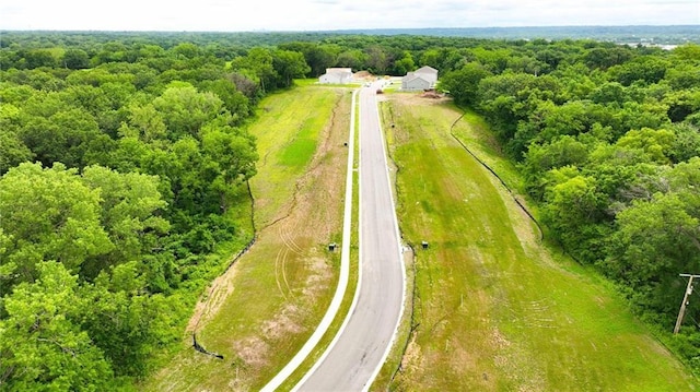 809 Highland Dr, Edwardsville, KS 66111 - aerial view of a heavily wooded area