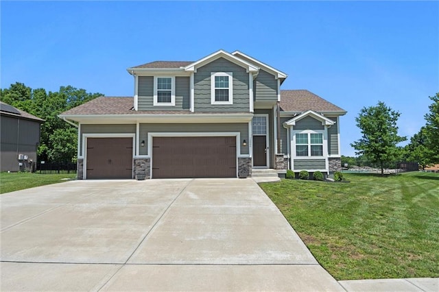 12004 Centennial St, Peculiar, MO 64078 - view of front of property with a front yard, concrete driveway, stone siding, and a garage