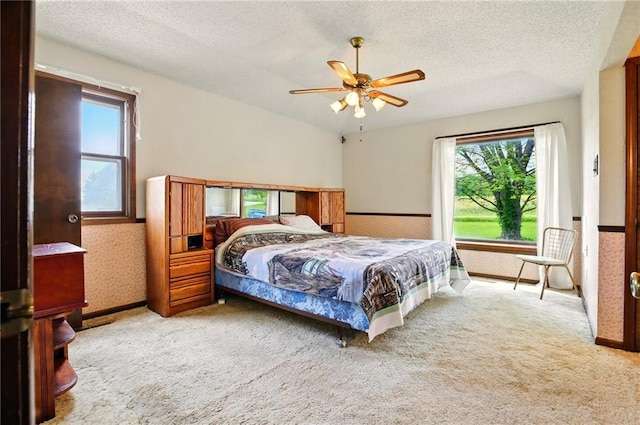 4613 SE Atchison Rd, Lathrop, MO 64465 - carpeted bedroom featuring a textured ceiling and ceiling fan