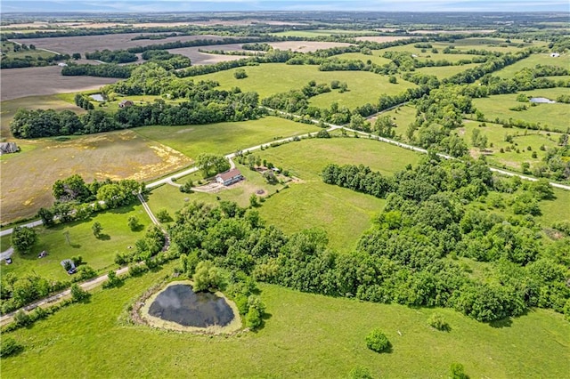 4613 SE Atchison Rd, Lathrop, MO 64465 - aerial view of property and surrounding area with rural landscape