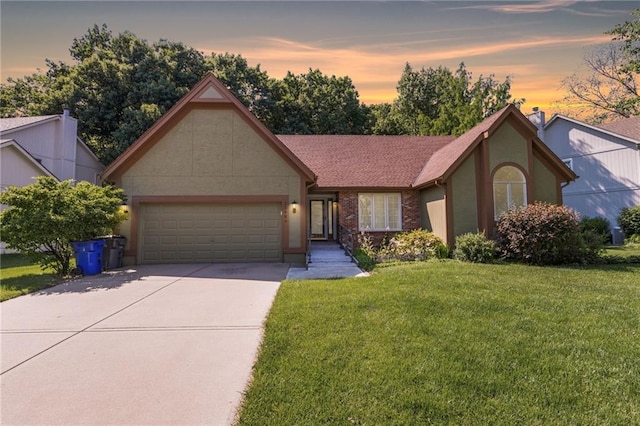 12484 S Hallet St, Olathe, KS 66062 - single story home with a garage, a lawn, and driveway