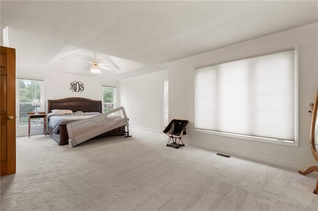 12484 S Hallet St, Olathe, KS 66062 - carpeted bedroom with a textured ceiling, a ceiling fan, and baseboards