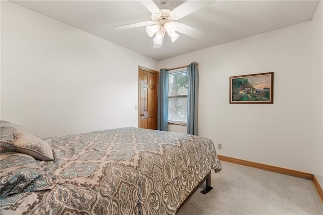 12484 S Hallet St, Olathe, KS 66062 - bedroom featuring light carpet, baseboards, and ceiling fan