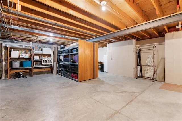 12484 S Hallet St, Olathe, KS 66062 - unfinished basement with freestanding refrigerator