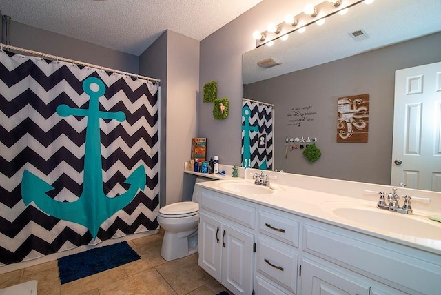 4737 Lone Elm St, Shawnee, KS 66226 - full bathroom featuring double vanity, toilet, curtained shower, tile patterned floors, and a textured ceiling