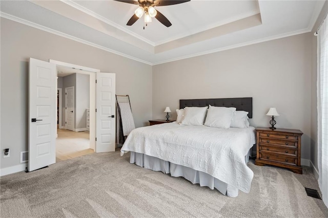 3112 Legacy Wood Dr, Lees Summit, MO 64086 - bedroom with a raised ceiling, carpet floors, crown molding, baseboards, and ceiling fan