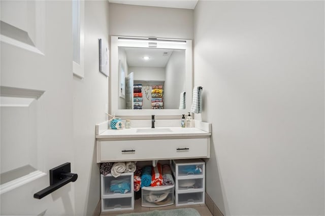 3112 Legacy Wood Dr, Lees Summit, MO 64086 - bathroom featuring vanity and baseboards