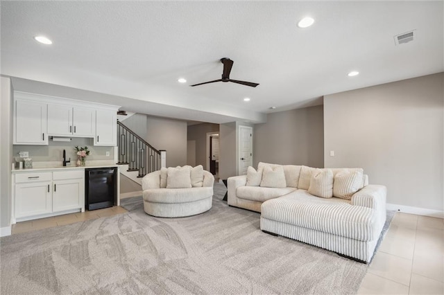 3112 Legacy Wood Dr, Lees Summit, MO 64086 - living room featuring light tile patterned flooring, stairs, baseboards, a ceiling fan, and recessed lighting