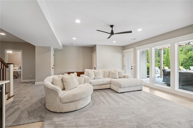 3112 Legacy Wood Dr, Lees Summit, MO 64086 - living room featuring recessed lighting, light colored carpet, ceiling fan, baseboards, and stairs