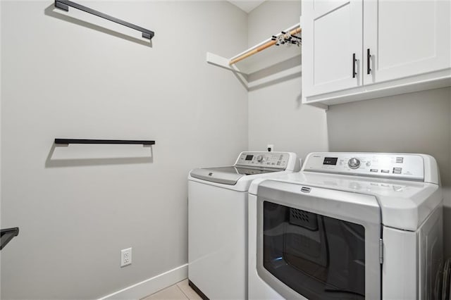 3112 Legacy Wood Dr, Lees Summit, MO 64086 - washroom with cabinet space, independent washer and dryer, baseboards, and light tile patterned flooring