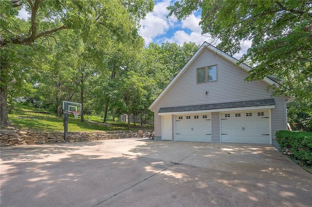 21614 W 72nd St, Shawnee, KS 66218 - view of property exterior with a detached garage