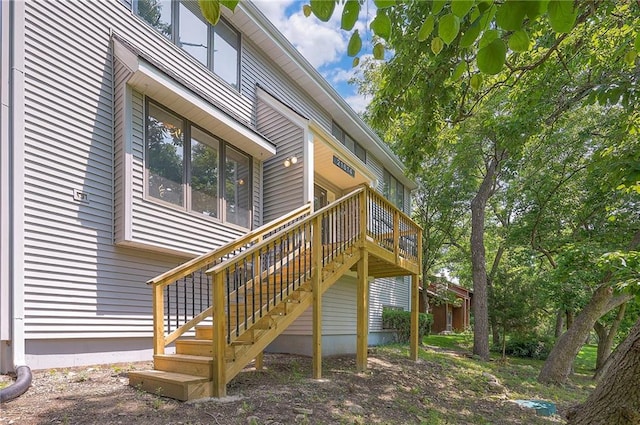 21614 W 72nd St, Shawnee, KS 66218 - view of property exterior with a deck and stairway