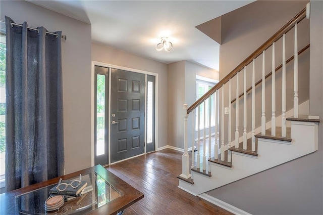 21614 W 72nd St, Shawnee, KS 66218 - foyer entrance with healthy amount of natural light, hardwood / wood-style flooring, baseboards, and stairway