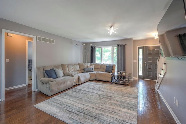 21614 W 72nd St, Shawnee, KS 66218 - living room with dark wood-style floors and baseboards