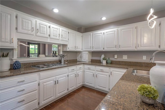21614 W 72nd St, Shawnee, KS 66218 - kitchen with cooktop, white cabinetry, a sink, dark wood-style floors, and recessed lighting