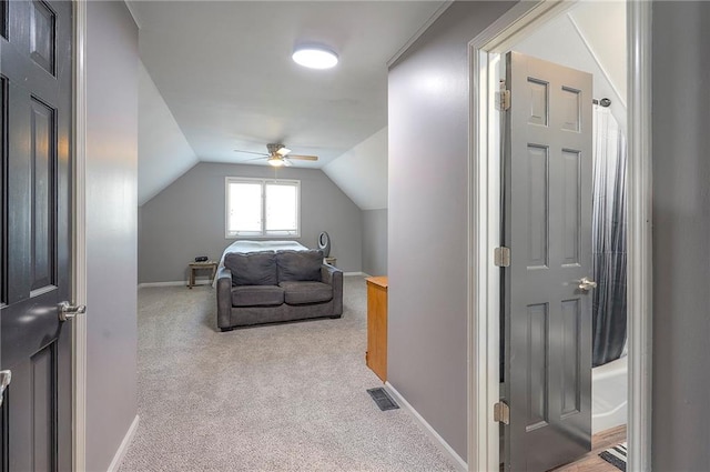 21614 W 72nd St, Shawnee, KS 66218 - carpeted bedroom featuring lofted ceiling, baseboards, and a ceiling fan