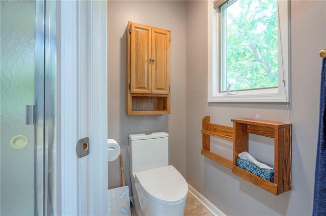 21614 W 72nd St, Shawnee, KS 66218 - bathroom featuring toilet and baseboards