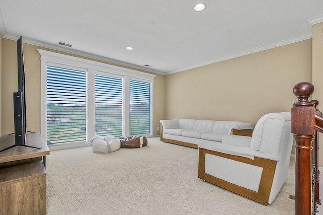 9705 Sunset Cir, Lenexa, KS 66220 - carpeted living area featuring crown molding and recessed lighting