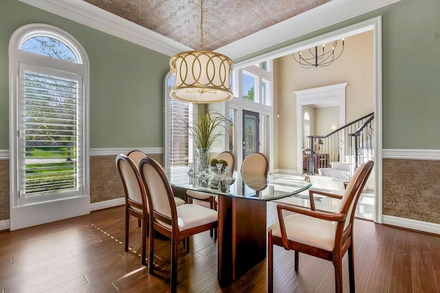 9705 Sunset Cir, Lenexa, KS 66220 - dining area featuring hardwood / wood-style flooring, stairway, and baseboards
