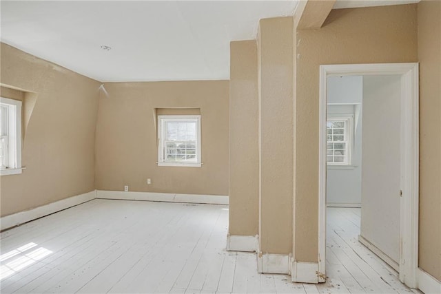 301 W Van Buren St, Gallatin, MO 64640 - spare room featuring plenty of natural light and hardwood / wood-style flooring