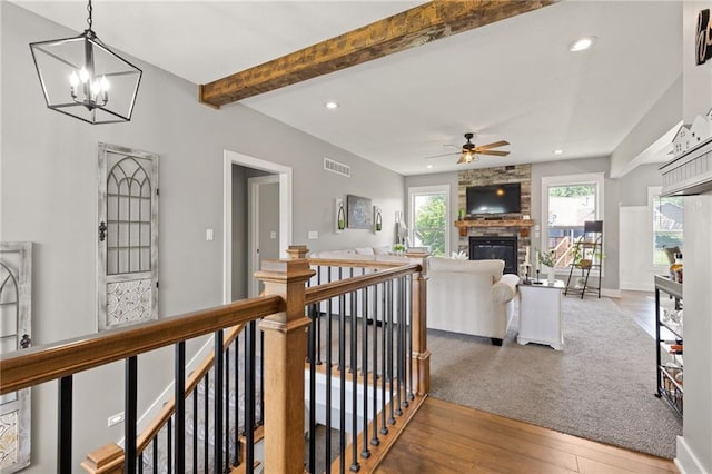 481 Olive Ct, Warrensburg, MO 64093 - hall with an upstairs landing, wood finished floors, recessed lighting, a chandelier, and beamed ceiling