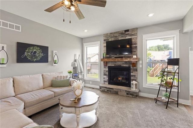 481 Olive Ct, Warrensburg, MO 64093 - living room with plenty of natural light, a ceiling fan, a fireplace, baseboards, and recessed lighting