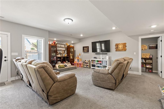 481 Olive Ct, Warrensburg, MO 64093 - living room featuring recessed lighting, light carpet, and baseboards