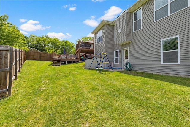 481 Olive Ct, Warrensburg, MO 64093 - view of yard with a wooden deck