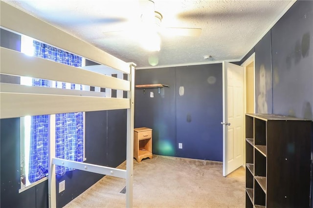 614 SW T Hwy, Holden, MO 64040 - unfurnished bedroom with carpet flooring, a textured ceiling, and ceiling fan