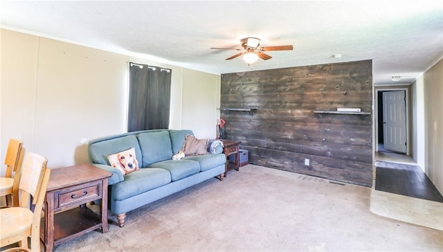 614 SW T Hwy, Holden, MO 64040 - living room featuring a ceiling fan and carpet