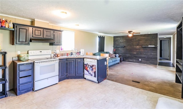 614 SW T Hwy, Holden, MO 64040 - kitchen with white electric range, a peninsula, ceiling fan, a textured ceiling, and light countertops