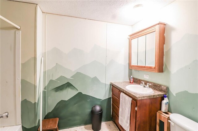 614 SW T Hwy, Holden, MO 64040 - full bathroom with vanity, a shower, and a textured ceiling