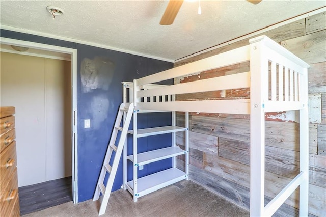 614 SW T Hwy, Holden, MO 64040 - unfurnished bedroom featuring a textured ceiling and ceiling fan